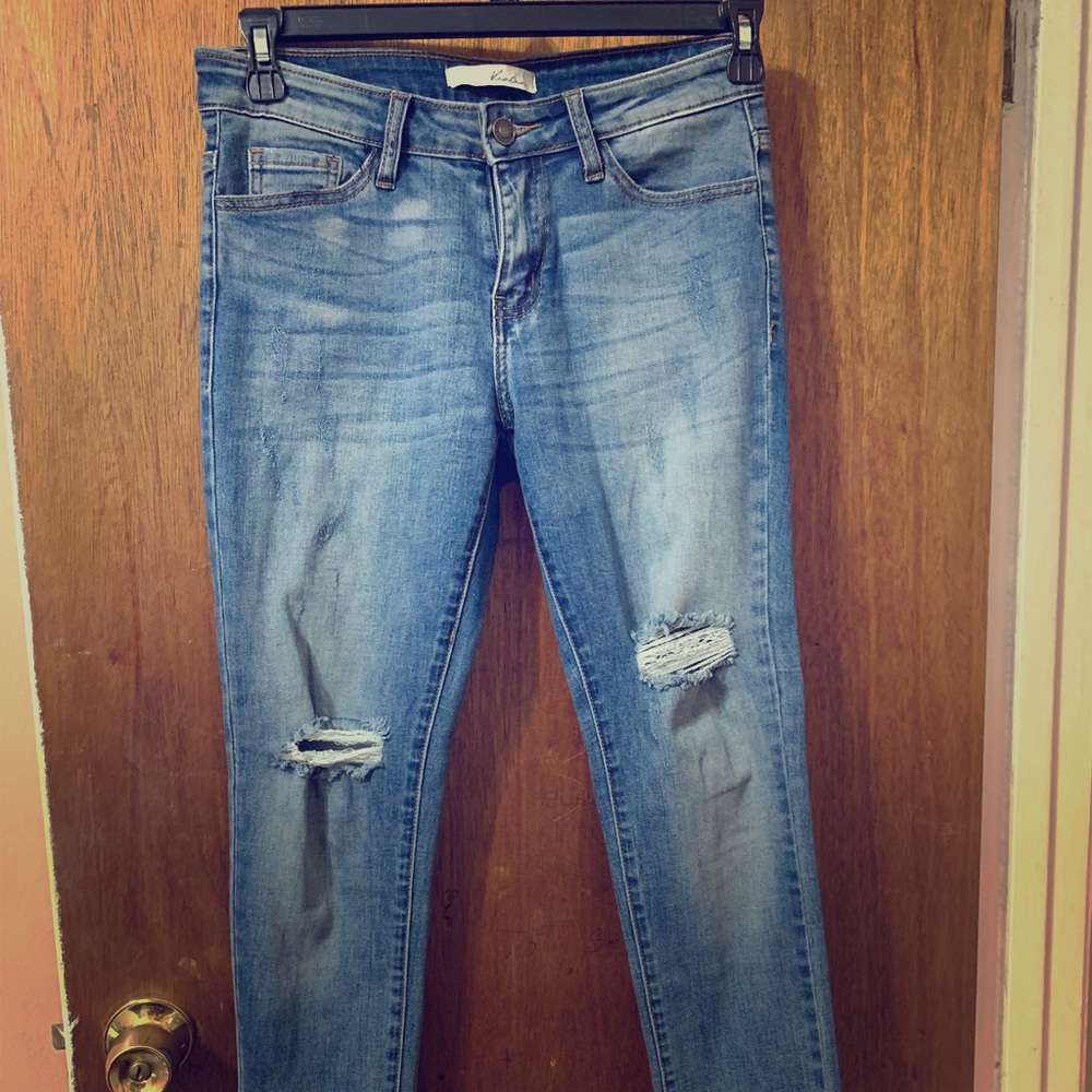 Ripped blue jeans